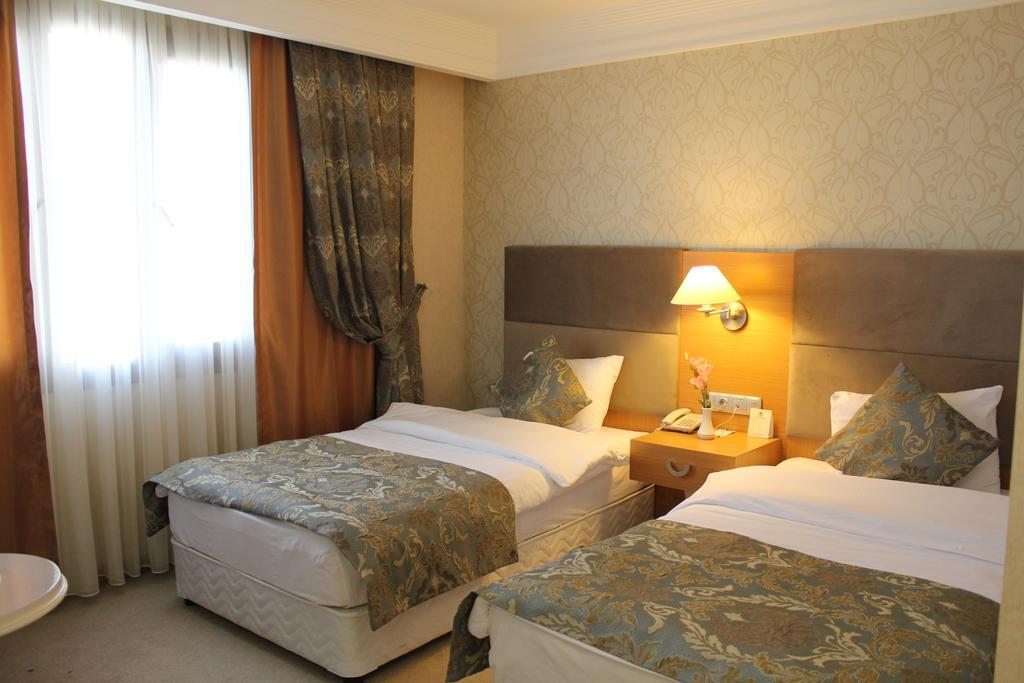 Adana Yukselhan Hotel Quarto foto
