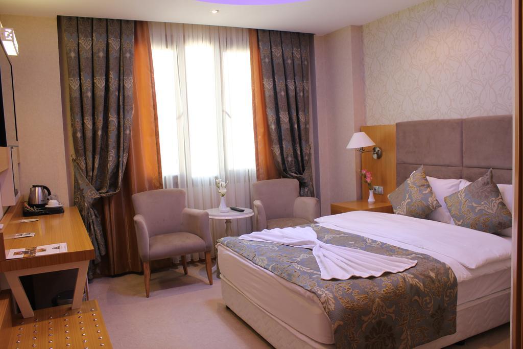Adana Yukselhan Hotel Quarto foto